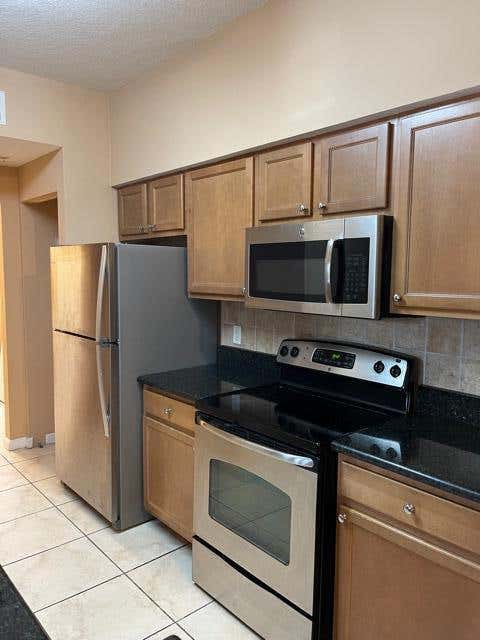 Photo of 4208 E Myrtlewood Cir Circle E #4208, Palm Beach Gardens, FL 33418 (MLS # B26039758)