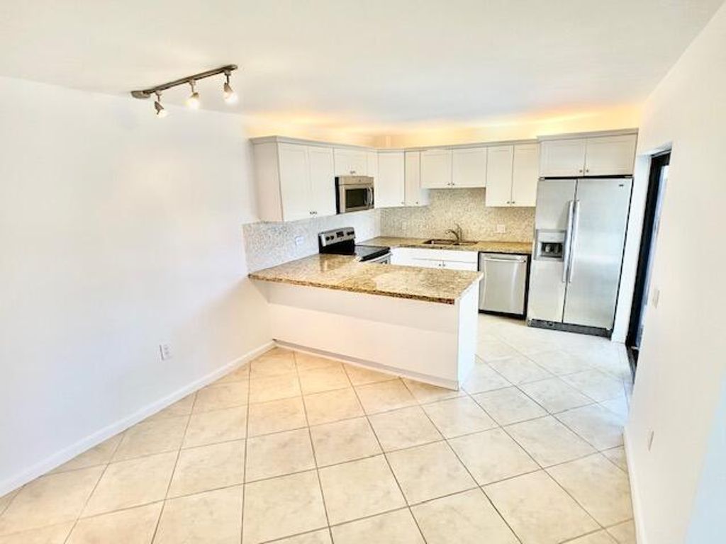 Photo of 3900 County Line Road #2d, Tequesta, FL 33469 (MLS # R10930011)