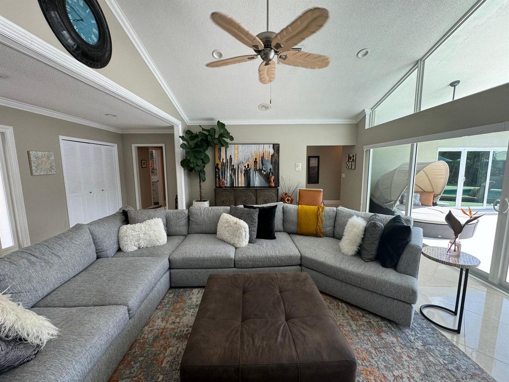 Photo of 1204 SW Tamarind Way, Boca Raton, FL 33486 (MLS # R11006973)