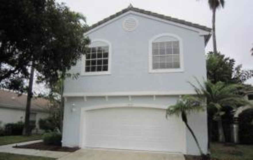 Located in community of Lawrence Grove of Boynton Beach.  This single family 2 story, 3 bedroom, 2.5 bath home has all you would ask for your family and friends to enjoy.  The Grove of Boynton is just minutes away from the Florida Turnpike and I-95-making it easy for travel to visit the beaches, shopping and fine dining.  Boynton Inlet offers great fishing and diving.  This is a resort style living community. New air conditioning unit has been installed along with new carpet. Very open floor plan with large living room, separate dining area that has sliding glass doors leading to an open patio.  Kitchen has beautiful maple wood cabinets with Formica countertops and extra storage space in nice sized pantry.  Kitchen is open to the dining room with a breakfast bar.  High vaulted ceiling. ceiling makes the square footage seem larger than it is.  Tile and carpet flooring through-out. Master suite has walk-n closets, master bathroom has dual sinks vanity roman tub/shower combo guest bathroom also has tub/shower combo and all bedrooms located on 2nd level.