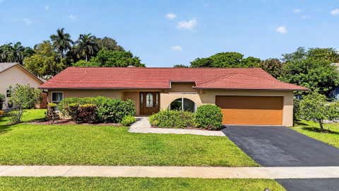 Photo of 20876 Sugarloaf Lane, Boca Raton, FL 33428 (MLS # B26022662)