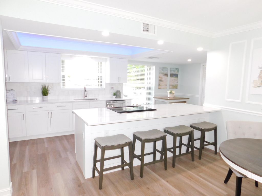 Photo of 601 Wingfoot Drive Dr #A, Jupiter, FL 33458 (MLS # R10814933)