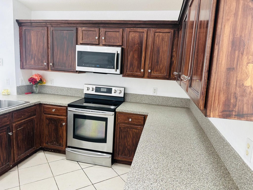 Photo of 2106 Little Torch Street, Riviera Beach, FL 33407 (MLS # B26081065)