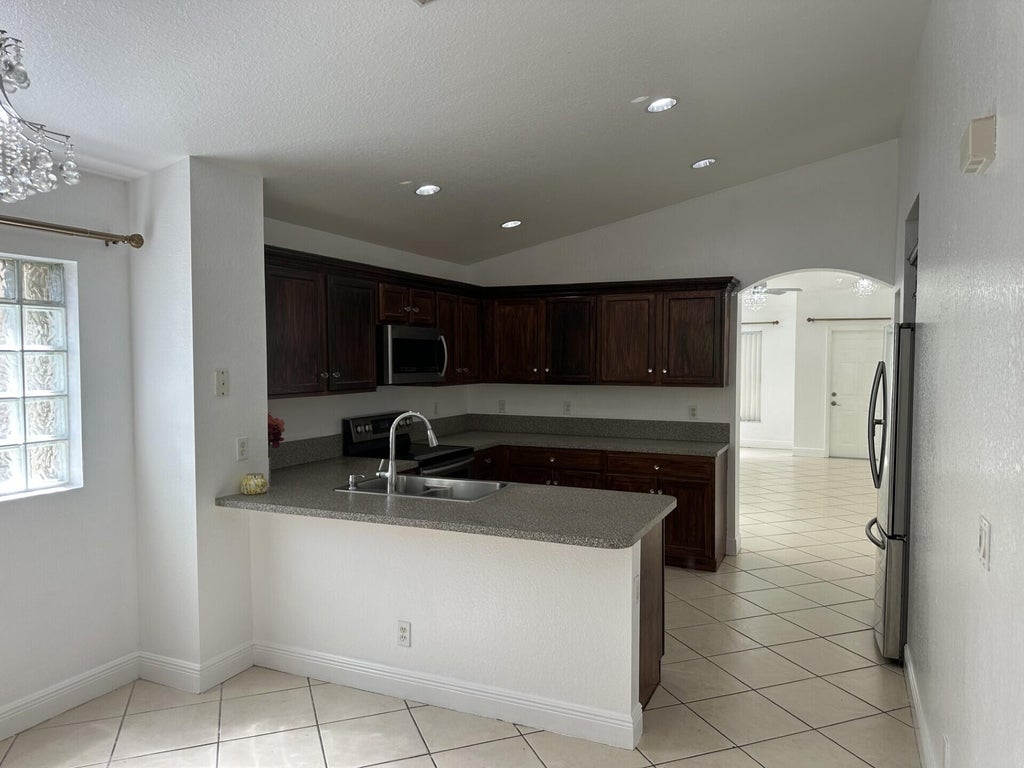 Photo of 2106 Little Torch Street, Riviera Beach, FL 33407 (MLS # B26081065)