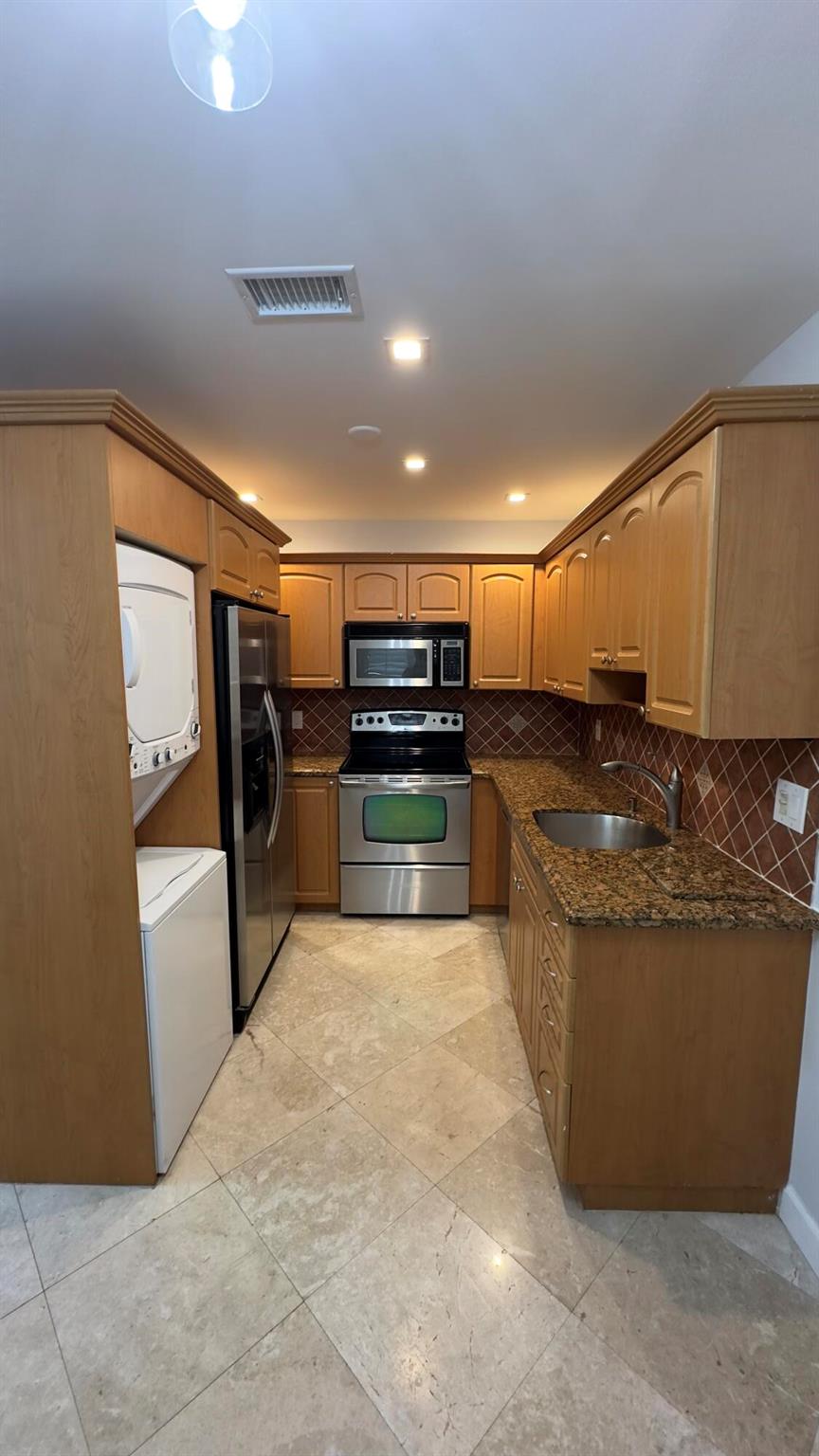 This beautifully maintained 2-bedroom, 1-bath villa with private screened-in patio. Inside, you'll find a host of upgrades: a newer water heater, updated electrical system to current code, a 4-year-old A/C, elegant marble flooring in the main living areas, warm wood flooring in the primary bedroom, and plantation shutters throughout. The stylish kitchen and updated bathroom add a modern touch, while ample indoor and outdoor storage make everyday living easy. Two dedicated parking spaces are conveniently located just steps from the front door. Boca Lakes residents enjoy a wide range of amenities, including weekly tennis matches, Bocce, card nights, and active Men's and Women's clubs--plus so much.All property details are deemed reliable but not guaranteed.