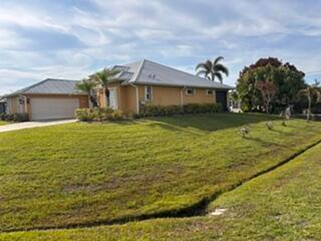 Photo of 5451 NW Empress Circle, Port Saint Lucie, FL 34983 (MLS # B26028061)