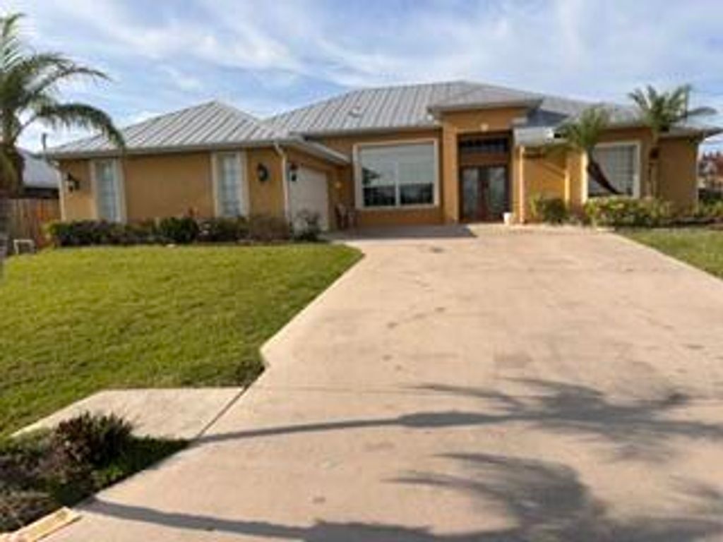 Photo of 5451 NW Empress Circle, Port Saint Lucie, FL 34983 (MLS # B26028061)