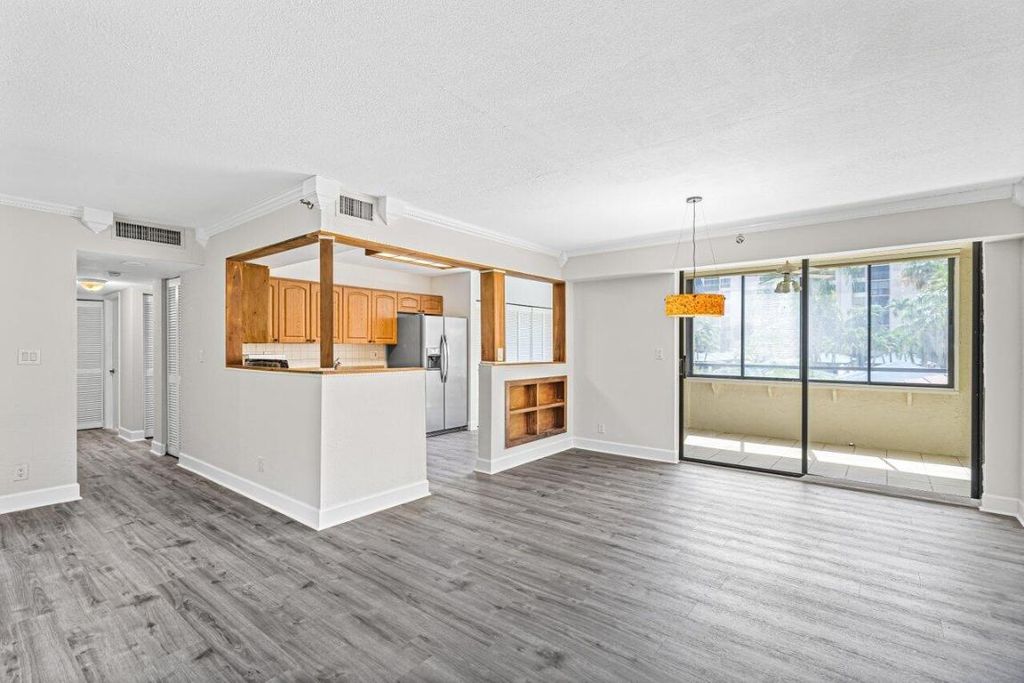 Photo of 7564 Regency Lake Drive #202, Boca Raton, FL 33433 (MLS # R10998873)