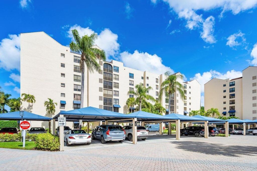 Photo of 7564 Regency Lake Drive #202, Boca Raton, FL 33433 (MLS # R10998873)