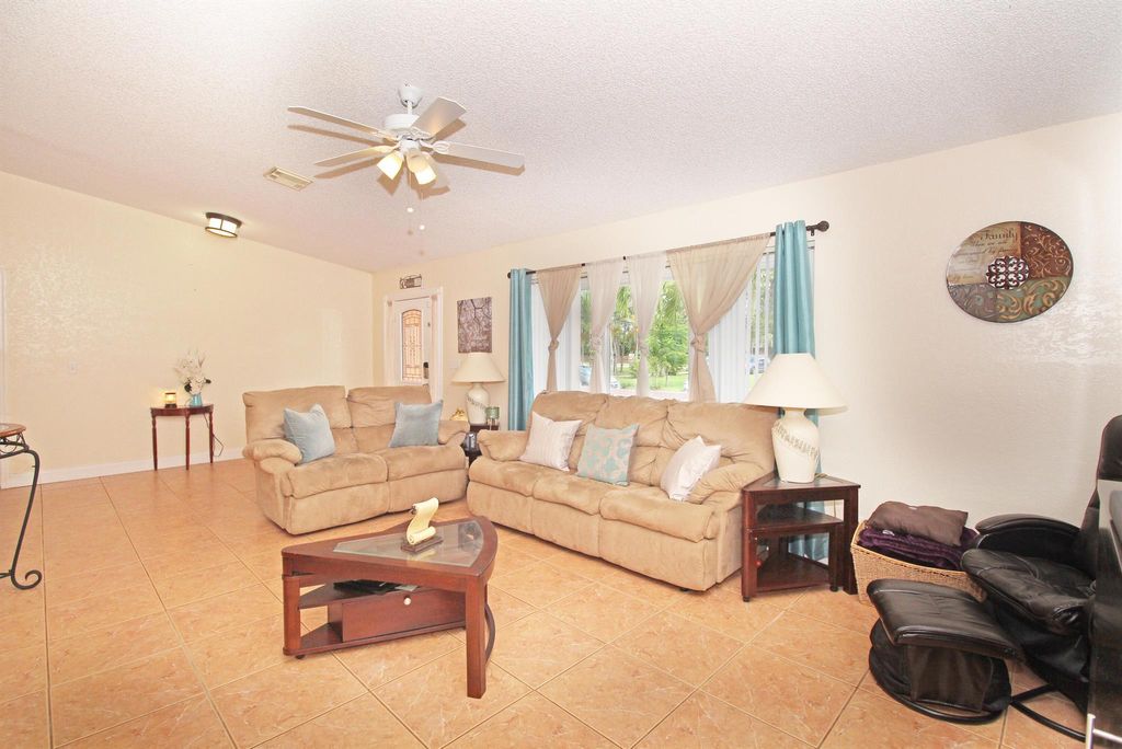 Photo of 12032 Orange Grove Boulevard, West Palm Beach, FL 33411 (MLS # R10980158)