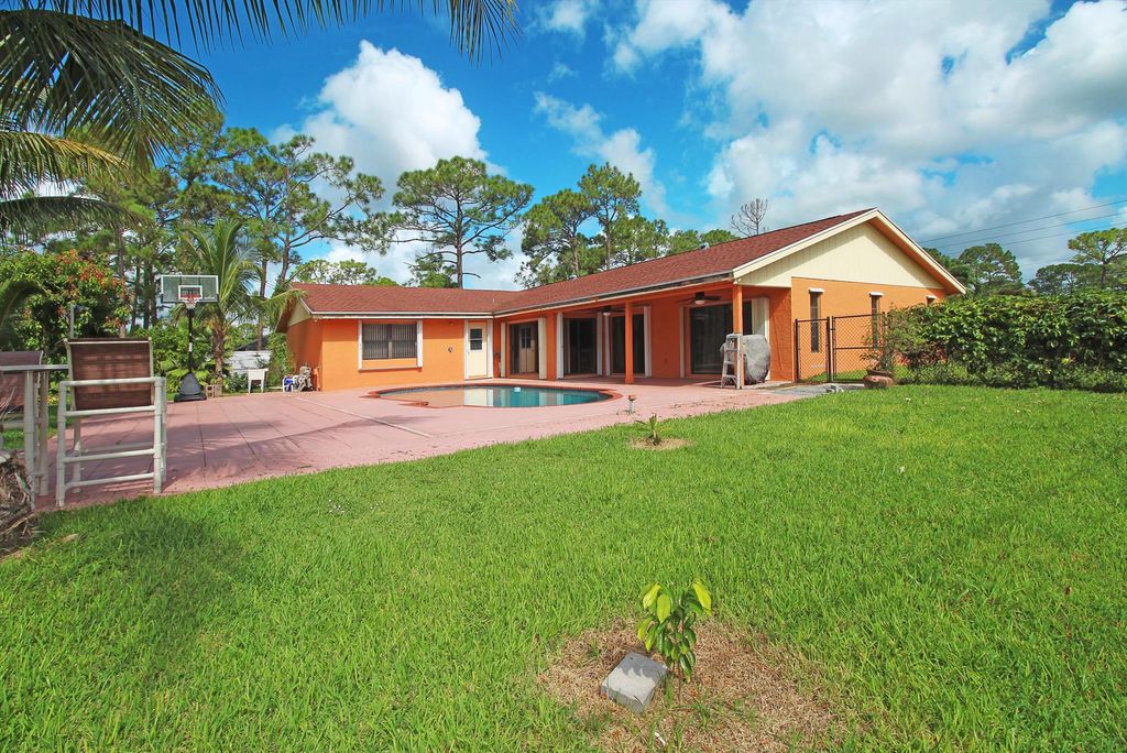 Photo of 12032 Orange Grove Boulevard, West Palm Beach, FL 33411 (MLS # R10980158)