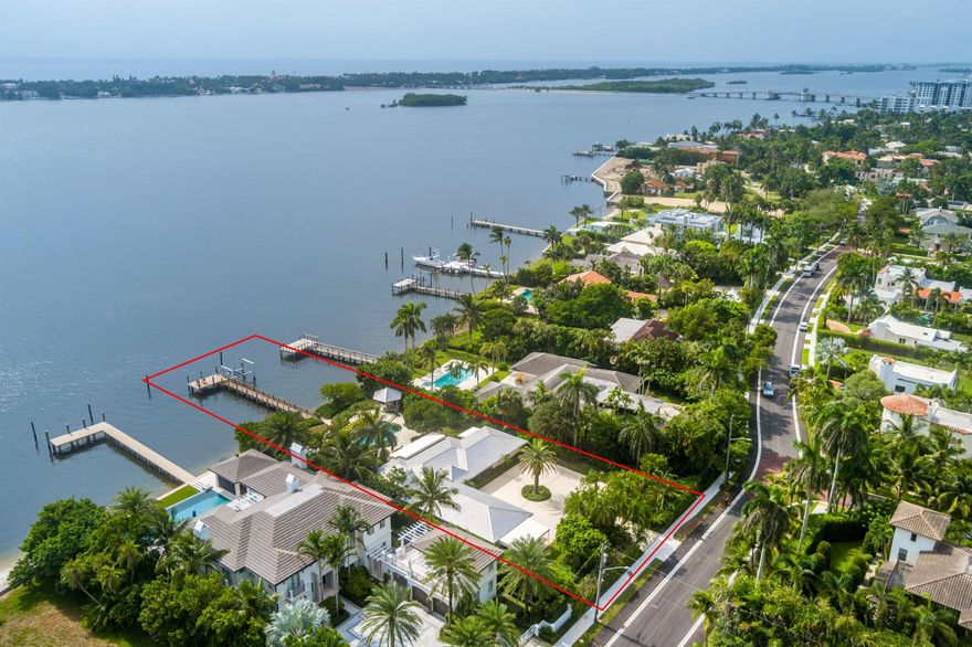 Rarely available and highly desirable, This is an opportunity to own a truly unique waterfront home in the highly sought-after Prospect Park neighborhood of West Palm Beach. With its prime location and breathtaking views, this property provides limitless potential for creating your dream home. This half acre property offers unparalleled privacy and exclusivity, featuring a direct-access boat dock with a lift, all within a private, gated setting. The non-landmarked charming 3-bedroom, 2-bathroom ranch-style home provides an open-concept living and dining, complemented by an expansive heated pool, integrated hot tub, and beautifully landscaped patio. Move in ready or build your dream home!