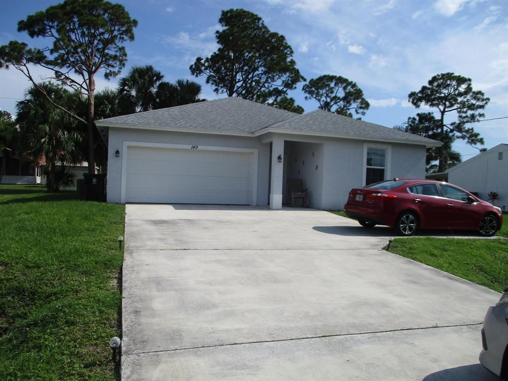Photo of 149 SW Tulip Boulevard, Port St Lucie, FL 34953 (MLS # R10895713)