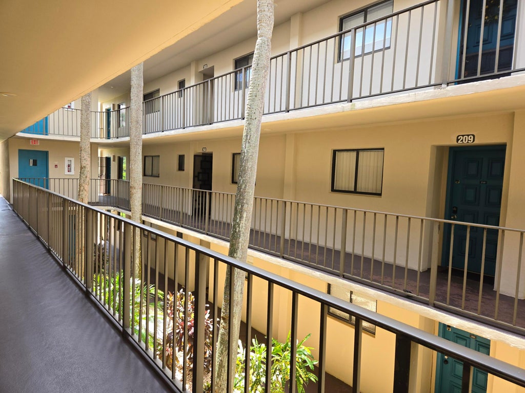 Photo of 5190 LAS VERDES Circle #209, Delray Beach, FL 33484 (MLS # B26067322)