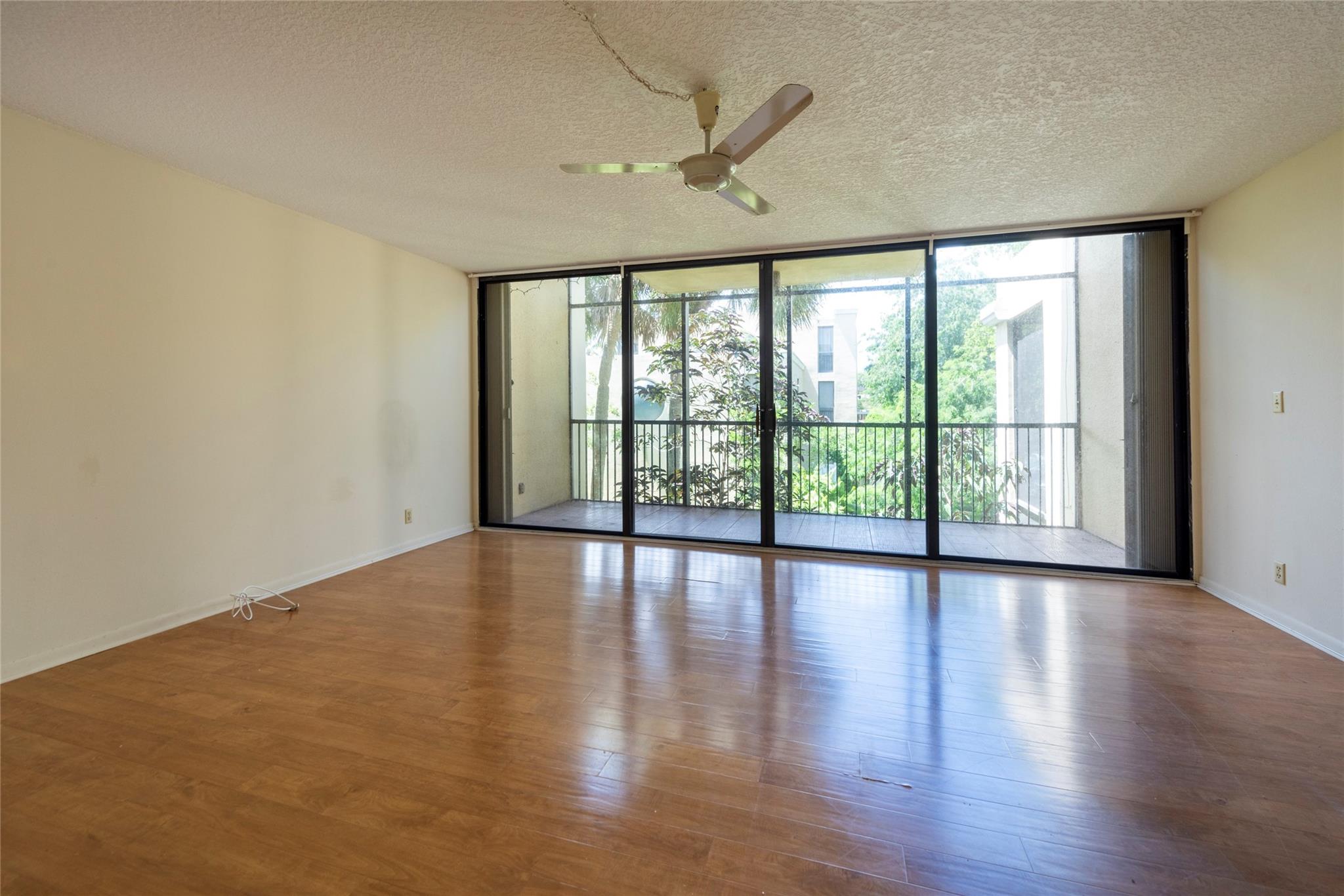 Modern Townhouse Style Condo with Garden & Water Views from Screened Balcony's on the First & Second Floors. New floors & freshly painted. Harvest Condominiums is a Great Location in Davie, Close to Nova Southeastern University, Shopping, Restaurants, Bamford Park with Soccer Fields & Pickleball Courts & Outdoor Pool & Fitness Center, Highways and so much more. Desirable Corner Unit for more Privacy, Lush Landscaping, Community offers Tennis, Community Pool, Assigned Parking and Guest, Car Wash Area, Community Center. Located in an all A Rated School District, near Publix and Golf Courses, Laundry Room inside unit. Currently rented by tenants paying $2K.