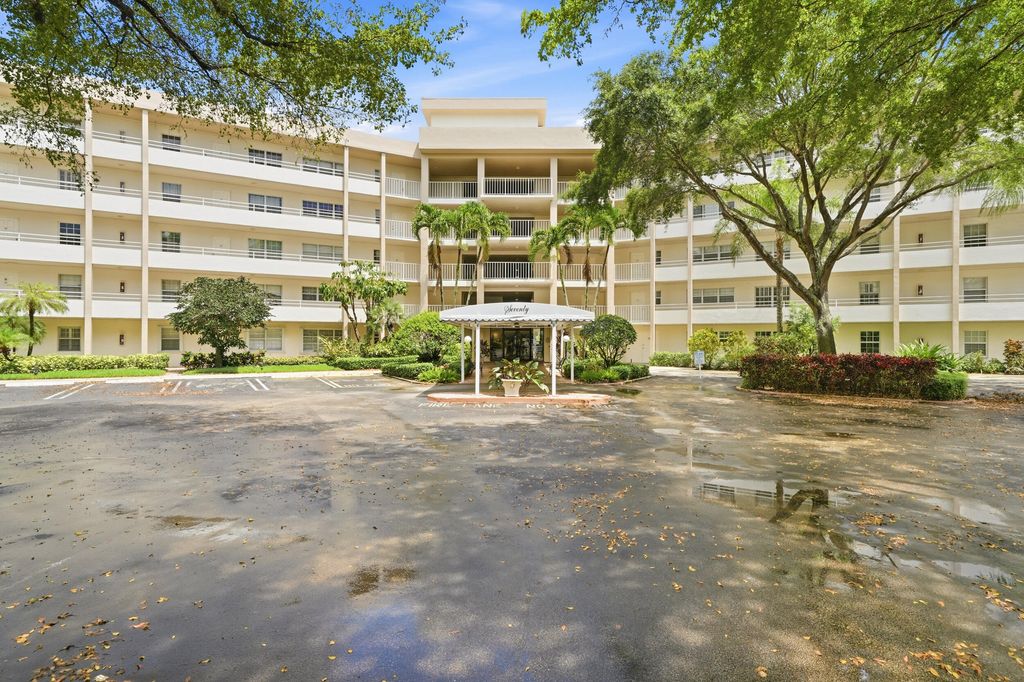 Photo of 3800 Oaks Clubhouse Drive #410, Pompano Beach, FL 33069 (MLS # B26028674)