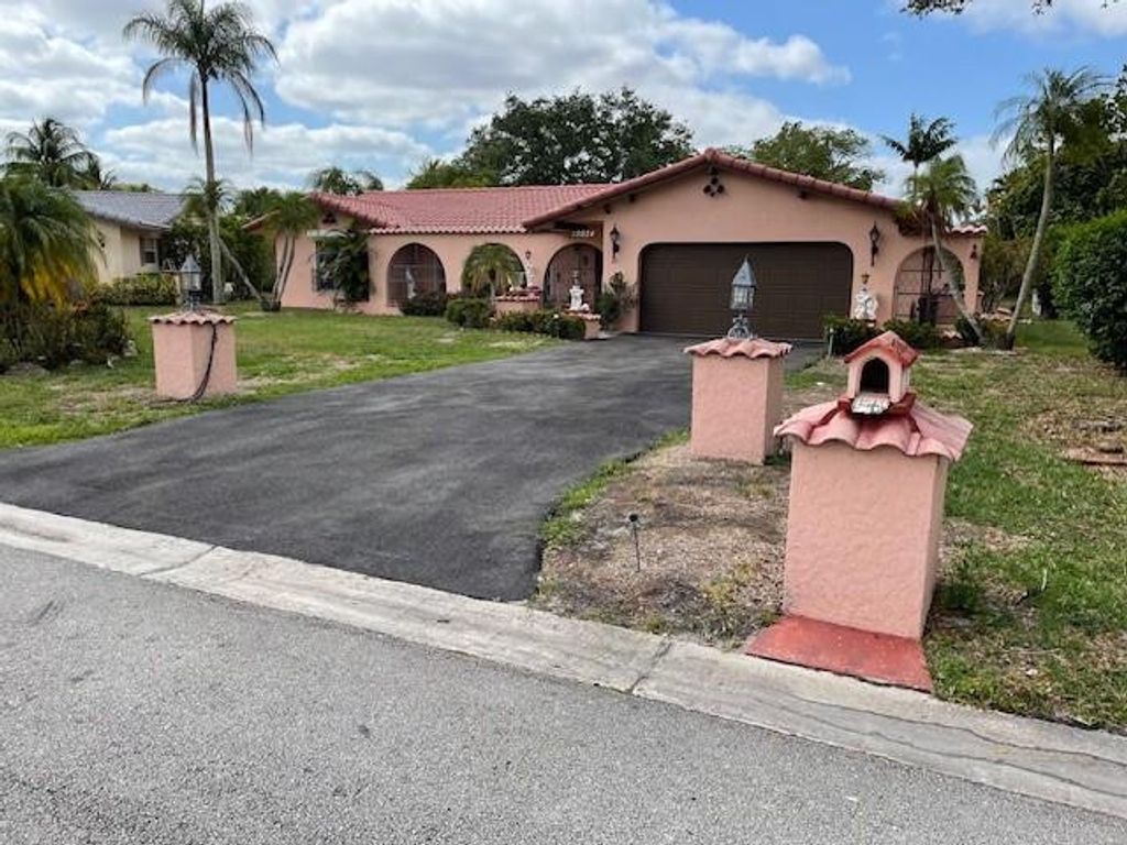 Photo of 10924 NW 41st Drive, Coral Springs, FL 33065 (MLS # F10499141)