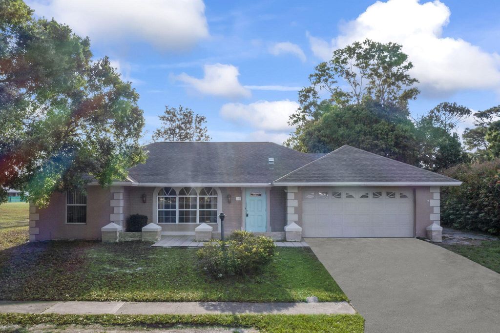 Photo of 450 NE Solida Circle, Port Saint Lucie, FL 34983 (MLS # R11064980)