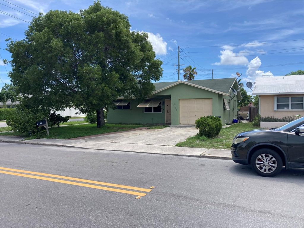Photo of 1230 N F Street, Lake Worth Beach, FL 33460 (MLS # F10447855)