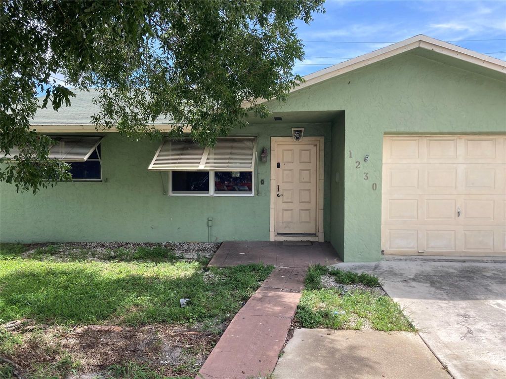 Photo of 1230 N F Street, Lake Worth Beach, FL 33460 (MLS # F10447855)