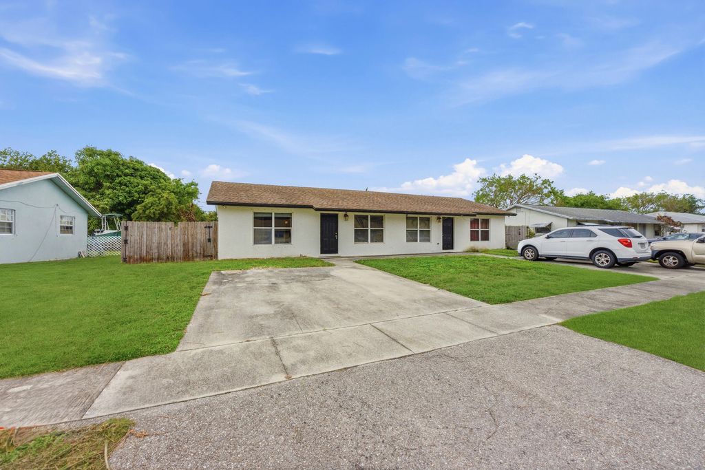 Photo of 3847 Roan Court E, West Palm Beach, FL 33403 (MLS # B26035533)