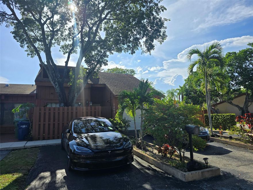 Beautiful 3/3, corner lot townhome with parking at your front door and ample guest parking in close proximity. Enjoy your own secret garden with an extended backyard that includes a seating area where you can enjoy a relaxing garden view and fruit trees. Fence private backyard with plenty of space for family gatherings Located in a well maintained and quiet family-oriented neighborhood in Inverrary. Beautiful kitchen with stainless steel appliances with granite counter tops. New 5-ton AC unit, updated lighting fixtures, freshly painted in living areas, Tile flooring, large master suite. Low HOA fees and no rental restrictions. Ideal for families and investors. Features include a loft style suite, vaulted ceilings. Loft can be used for 4th bedroom suite or place where the kids can play.