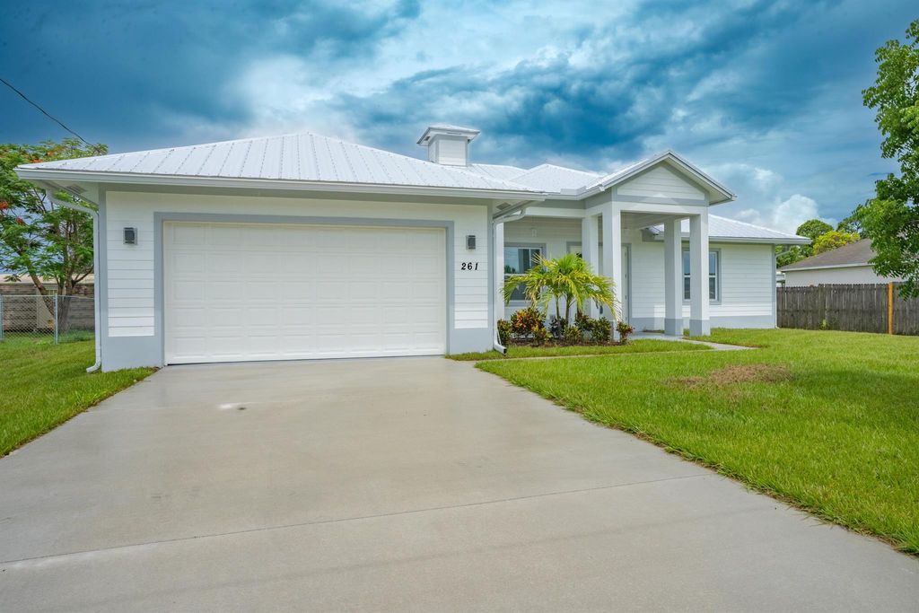 Photo of 261 NW Biltmore Street, Port St Lucie, FL 34983 (MLS # R10896090)