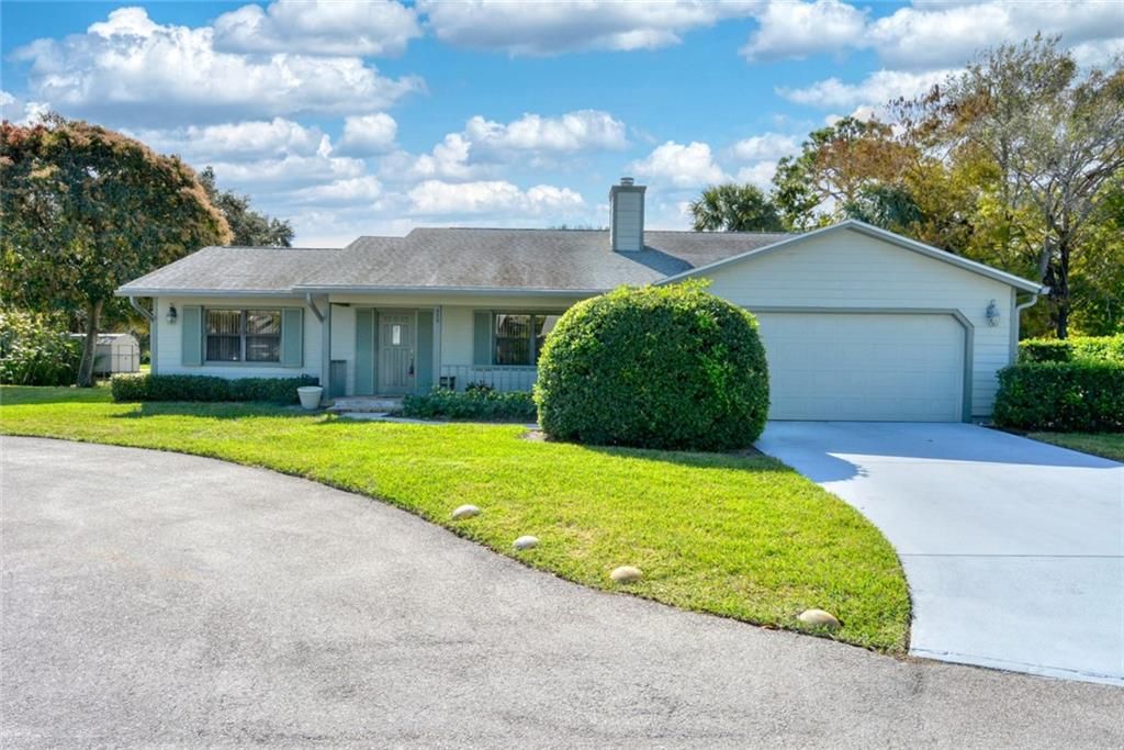 Photo of 934 NE Dahoon, Jensen Beach, FL 34957 (MLS # F10315099)