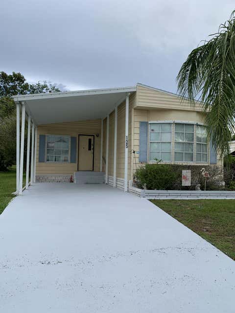Photo of 125 E Caribbean, Port Saint Lucie, FL 34952 (MLS # B26035872)