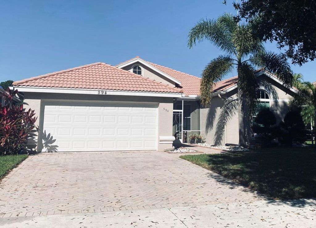 Photo of 594 SW Lake Charles Circle, Port Saint Lucie, FL 34986 (MLS # R10822673)