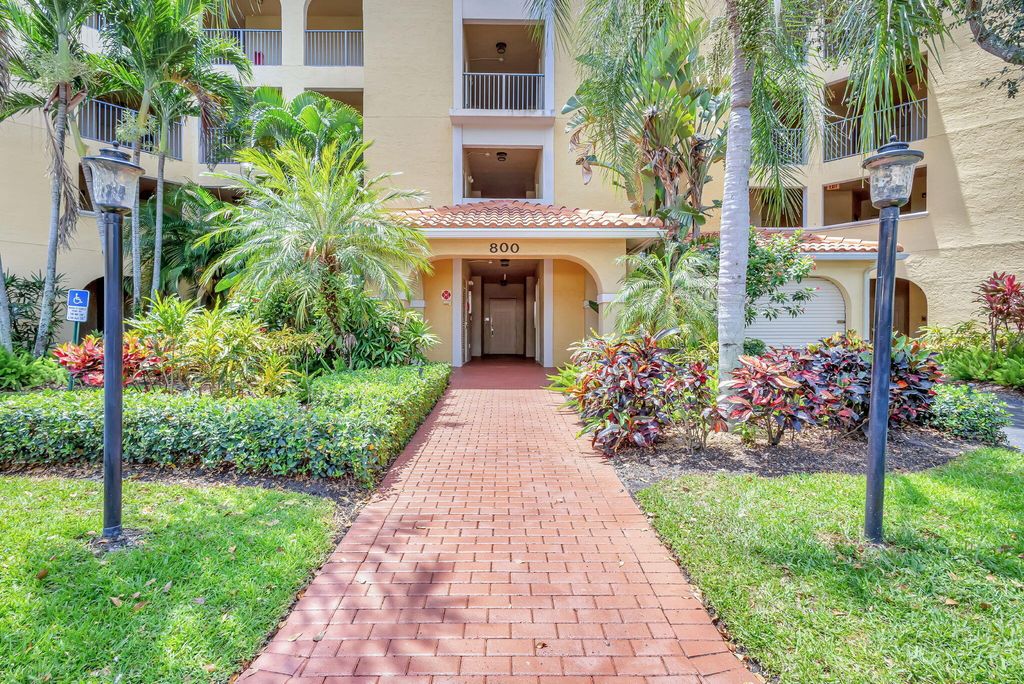 Photo of 800 Uno Lago Drive #302, Juno Beach, FL 33408 (MLS # B26009470)