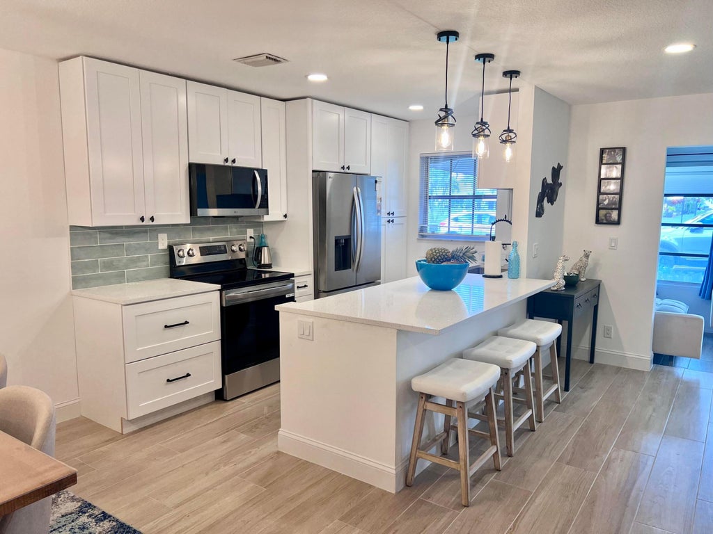 Photo of 1130 Circle Terrace W #B, Delray Beach, FL 33445 (MLS # R11067157)
