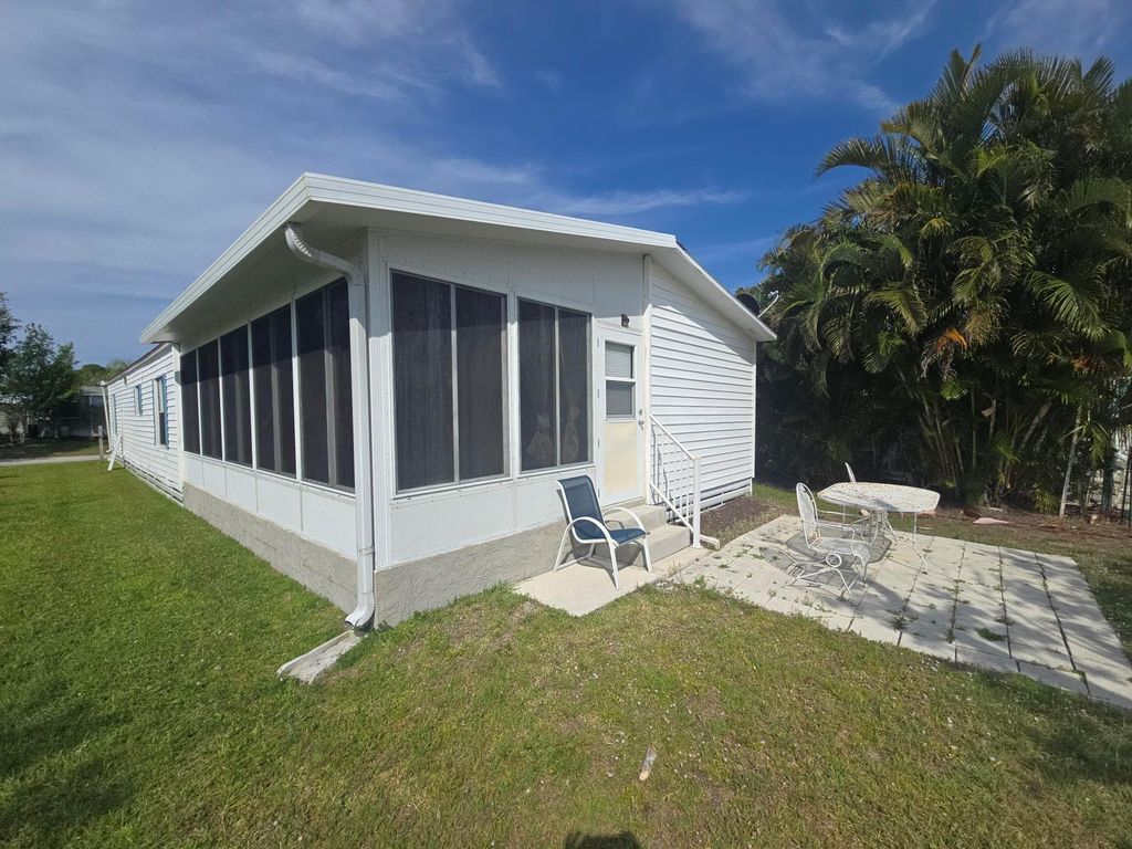 Photo of 61 Calle De Lagos, Fort Pierce, FL 34951 (MLS # R11083909)