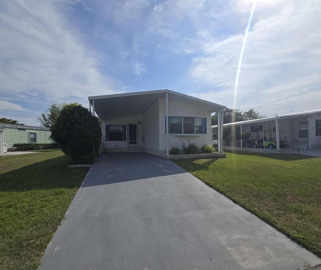 Photo of 61 Calle De Lagos, Fort Pierce, FL 34951 (MLS # R11083909)