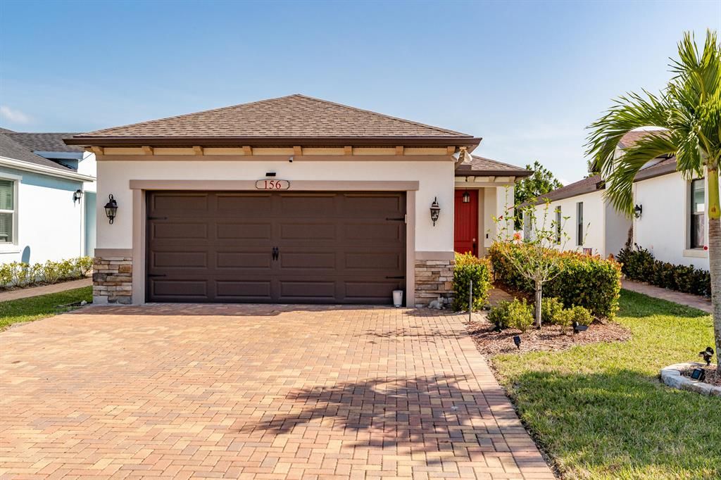 Photo of 156 SE Via Visconti, Port St Lucie, FL 34952 (MLS # R10873937)