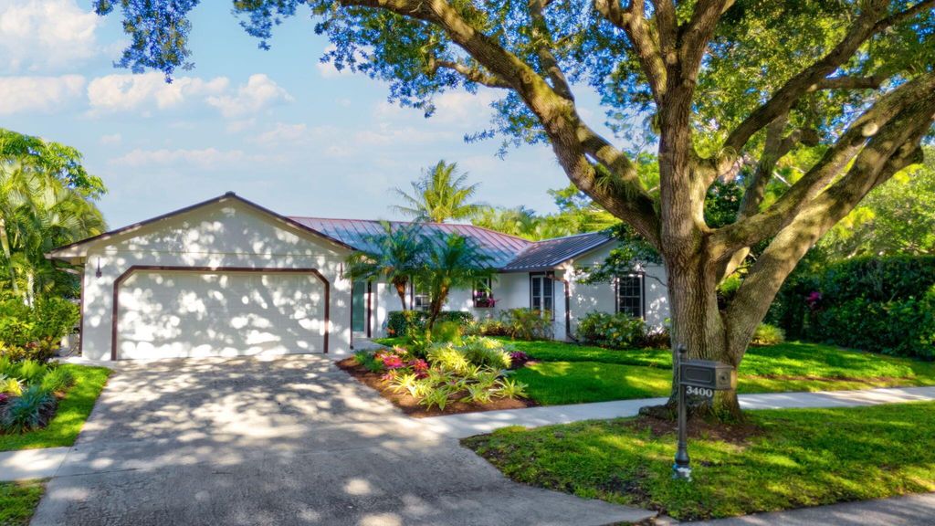 Photo of 3400 Pine Haven Circle, Boca Raton, FL 33431 (MLS # R10983684)