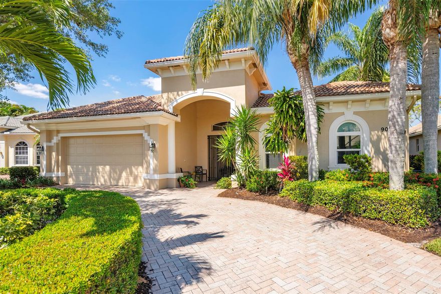 Stunning Spanish Revival-style, rare courtyard home w/breathtaking golf & lake views, perfectly positioned across water & bird habitat. Enjoy the view w/out worry of stray golf balls on 2nd hole green of the "Wanamaker Course" at PGA Village, award-winning golf resort. Course designed to preserve natural habitats, w/bird sanctuary & moving water (no stagnant ponds), lush landscaping, pristine lawns & manned security. Minutes from Clover Park, NY Mets spring training stadium. Expansive 3,200+ SF, stately 12 ft ceilng, upgraded trim, crown moulding. Solid CBS construction, terracotta barrel tile roof, paver drive/patio, impact windws, accordion shutters. Bonus guest house w/4th bedrm, bath, kitchenette—ideal for guests/office/studio. Heated pool/spa. Gourmet kitchen. Luxurious master suite. Flex potential 4th Bedroom w/ bathroom