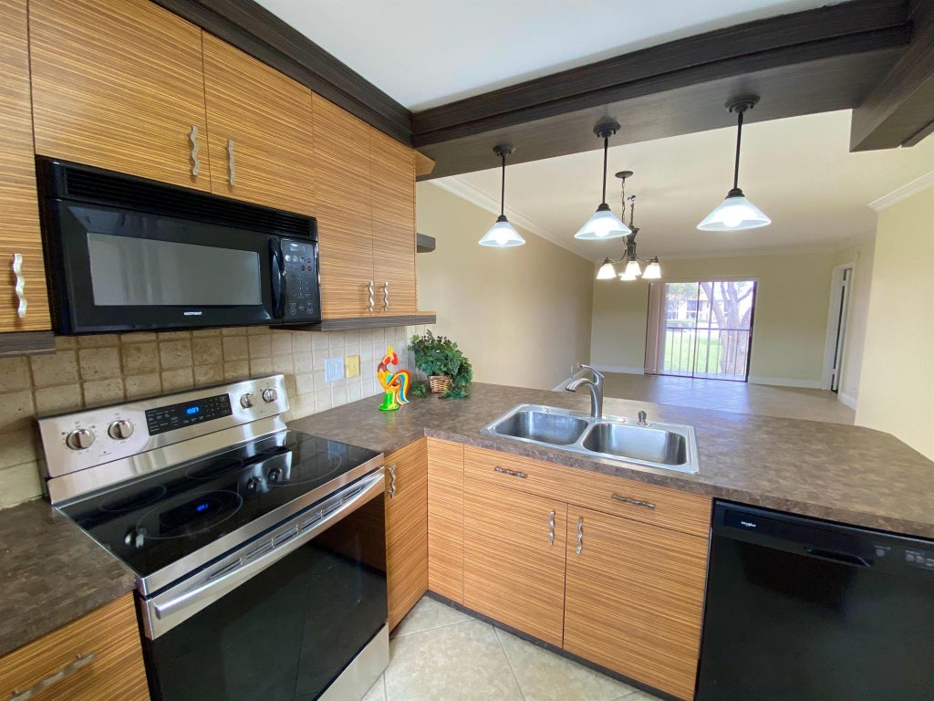 Photo of 6760 Palmetto Circle S #202, Boca Raton, FL 33433 (MLS # R10914154)