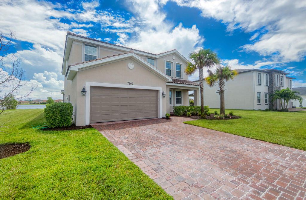 Photo of 7609 NW Archerfield Drive, Port Saint Lucie, FL 34987 (MLS # R11156452)