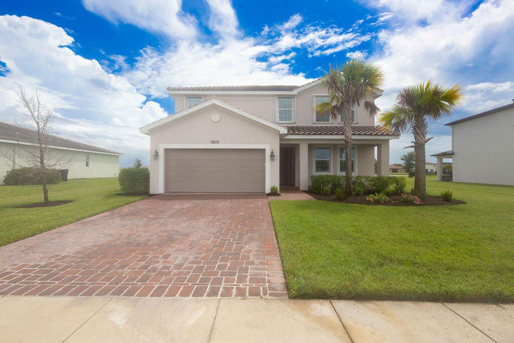 Photo of 7609 NW Archerfield Drive, Port Saint Lucie, FL 34987 (MLS # R11156452)