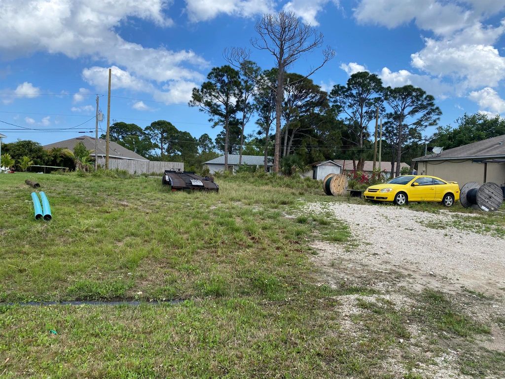 Photo of 936 SW Harvard Road, Port Saint Lucie, FL 34953 (MLS # R10784695)
