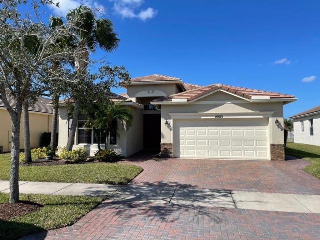 Photo of 10015 SW Chadwick Drive, Port Saint Lucie, FL 34987 (MLS # R10701234)