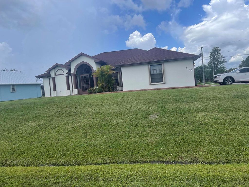 Photo of 3128 SE Card Terrace N, Port Saint Lucie, FL 34984 (MLS # R11123181)