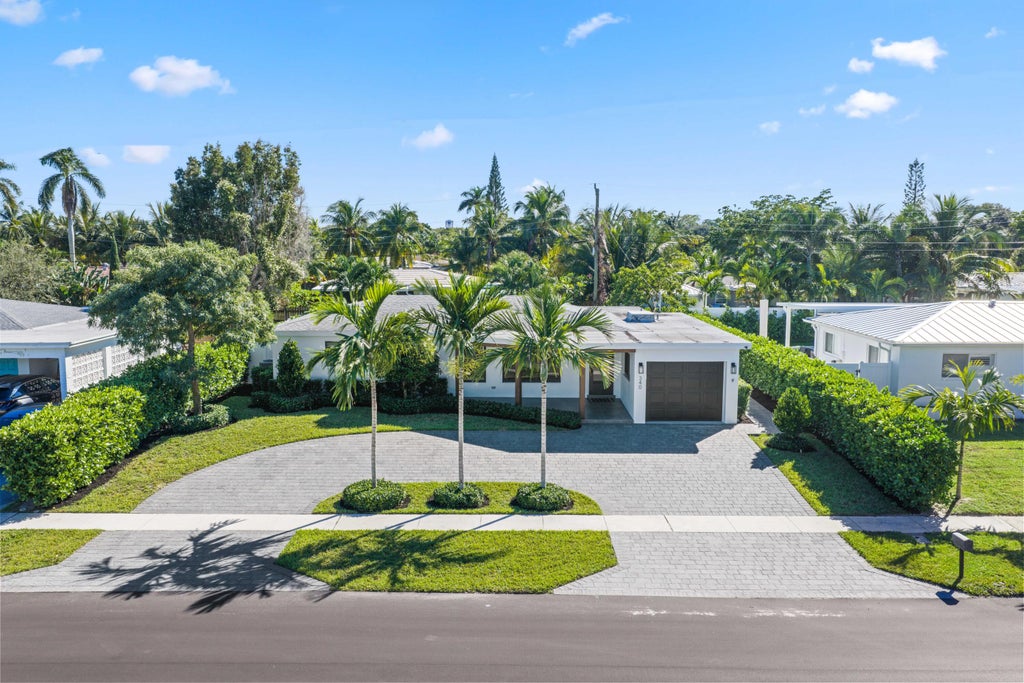 Photo of 340 NE 23rd Way, Boca Raton, FL 33431 (MLS # B26079058)