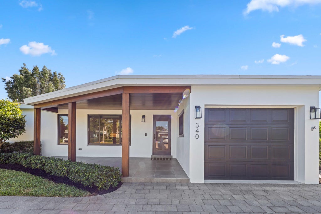Photo of 340 NE 23rd Way, Boca Raton, FL 33431 (MLS # B26079058)