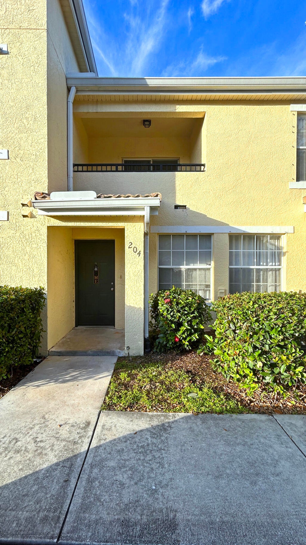 Photo of 104 SW Peacock Boulevard #3-204, Port Saint Lucie, FL 34986 (MLS # B26049249)