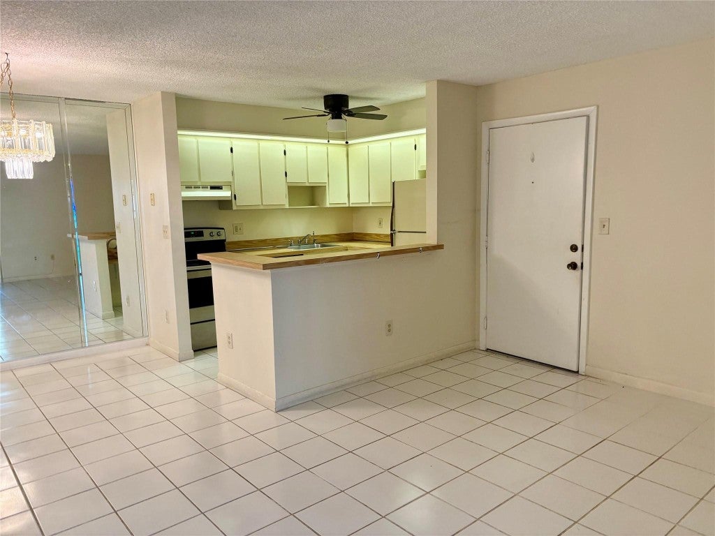 Photo of 9384 S Belfort Circle #101, Tamarac, FL 33321 (MLS # F10506884)