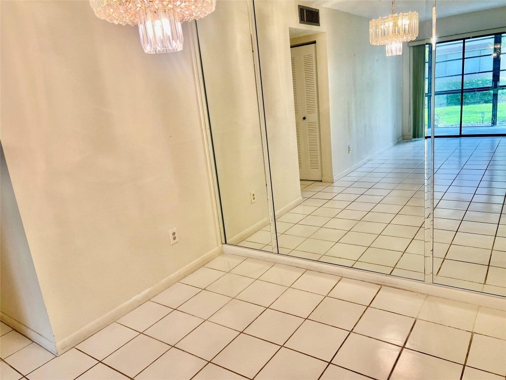 Photo of 9384 S Belfort Circle #101, Tamarac, FL 33321 (MLS # F10506884)