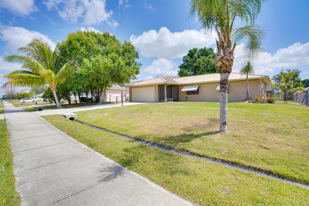 Photo of 1825 SW Cameo Boulevard, Port Saint Lucie, FL 34953 (MLS # R11079986)