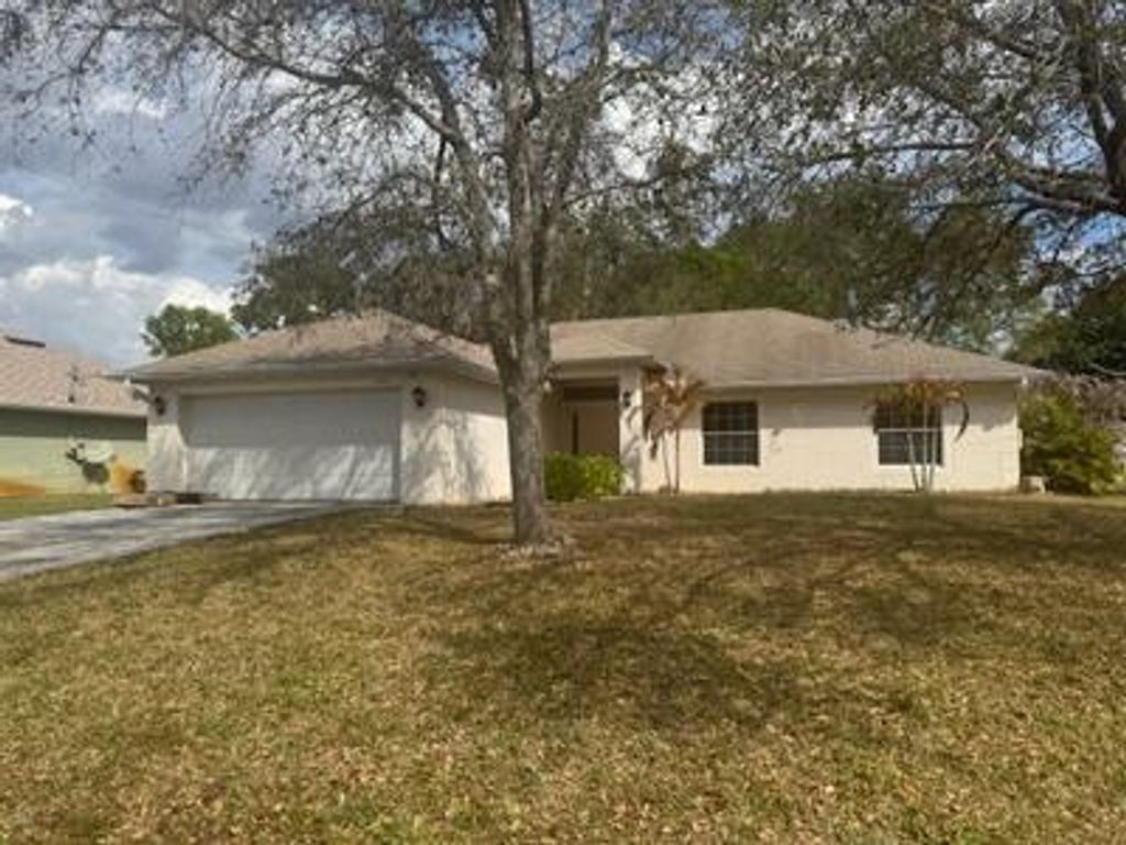 Photo of 2951 SW Lucerne Street, Port Saint Lucie, FL 34953 (MLS # R11169958)